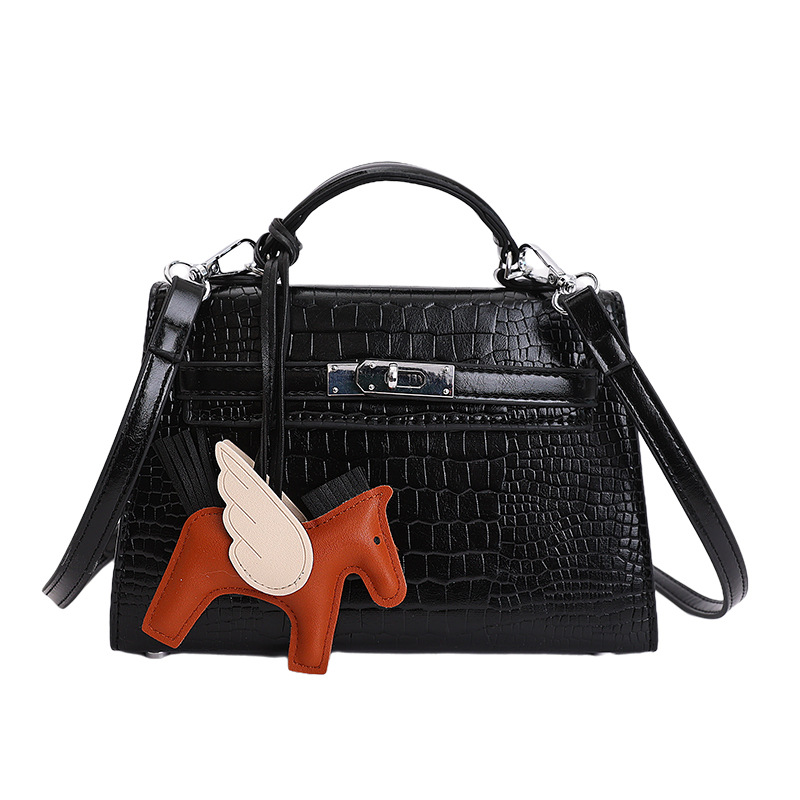 Nicho popular cocodrilo portátil bolso Kelly mujer 2026 nueva moda versátil alta sensación de hombro mochila