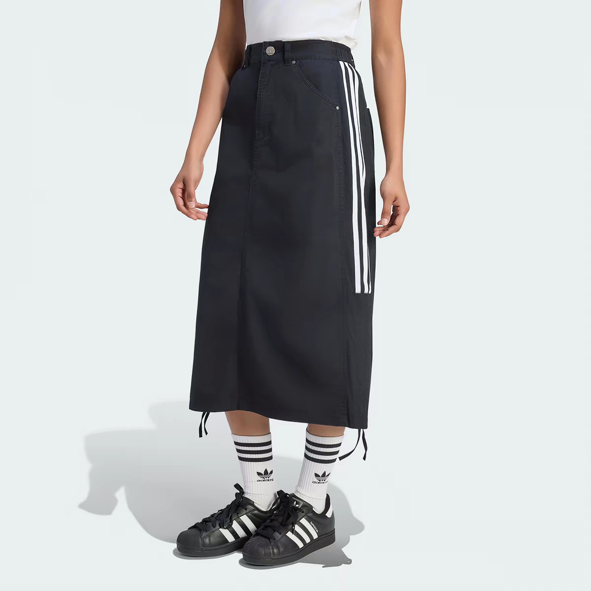 Fashionable and slimming workwear-style midi skirt with a unique European and American design, featuring a drawstring waist and trendy casual long skirt style