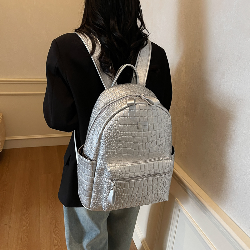 Moda coreana mochila de cuero suave para mujeres 2025 nuevo comercio exterior mochila de gran capacidad simple bolsa de viaje ligera