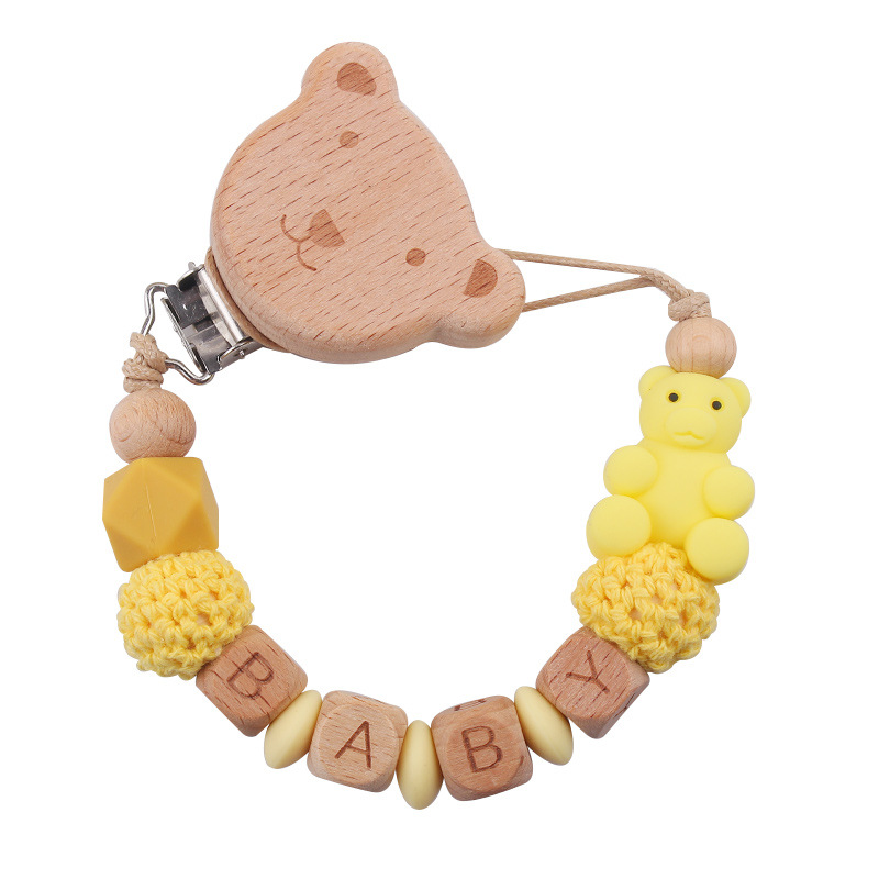 Nuevos productos para la madre y el bebé, clips de oso de haya, juguetes de dientes apretados para bebés, cadena de chupete de oso de oso de animales de dibujos animados