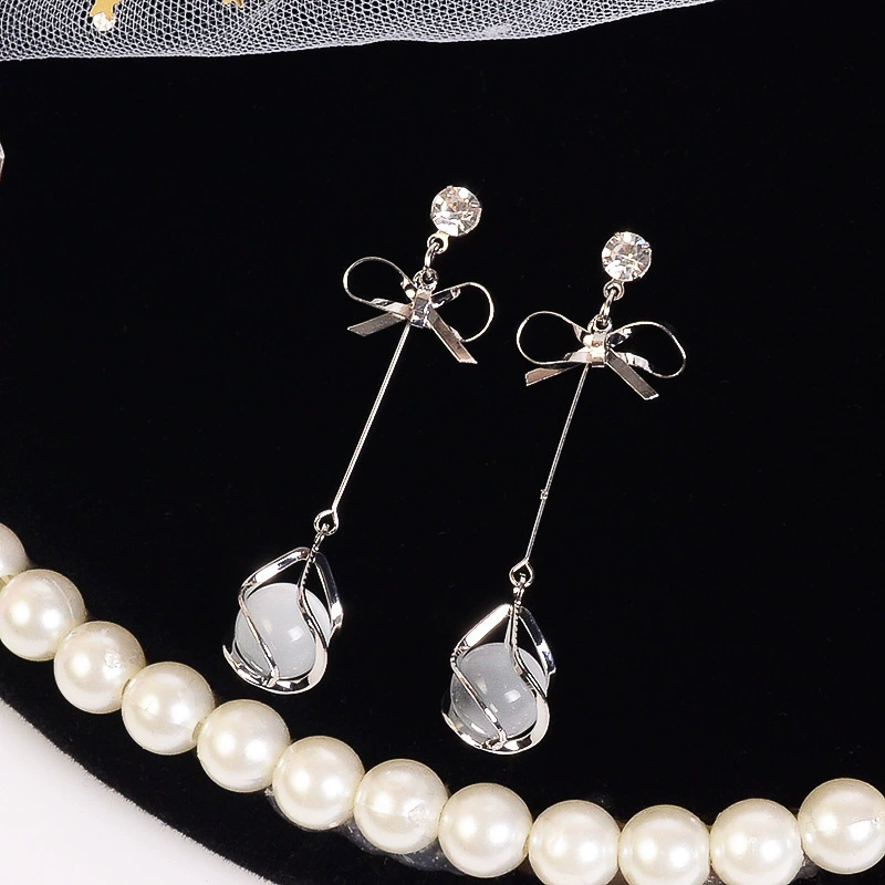 Earrings silver 925, bow design with cat's‑eye drop, lightweight dangle, trend seasonal style