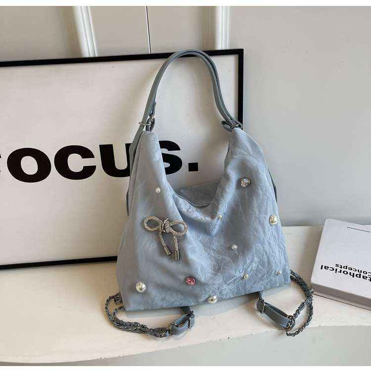 Bolsa de gran capacidad para mujeres 2024 nuevo nicho de alto nivel de diseño de diamantes de viaje multifuncional mochila de doble hombro inclinada