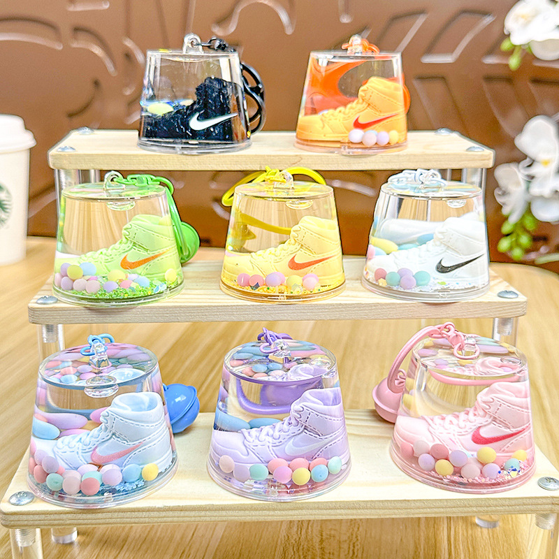 Cartoon redondo en aceite flotante AJ zapatos llavero de moda moda moda llavero de automóviles bolsa colgante