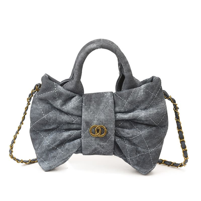 Bolsa de mano de chicas arco dulce cadena de diamante pliegue bolso de hombro 2026 nuevo bolso infantil transfronterizo