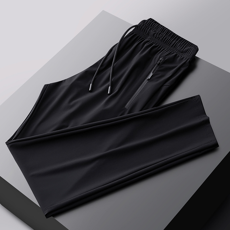 2025 verano pantalones deportivos de talla grande pantalones de hombre pantalones de aire acondicionado pantalones de seda de hielo de secado rápido pantalones de pierna recta gorda al por mayor