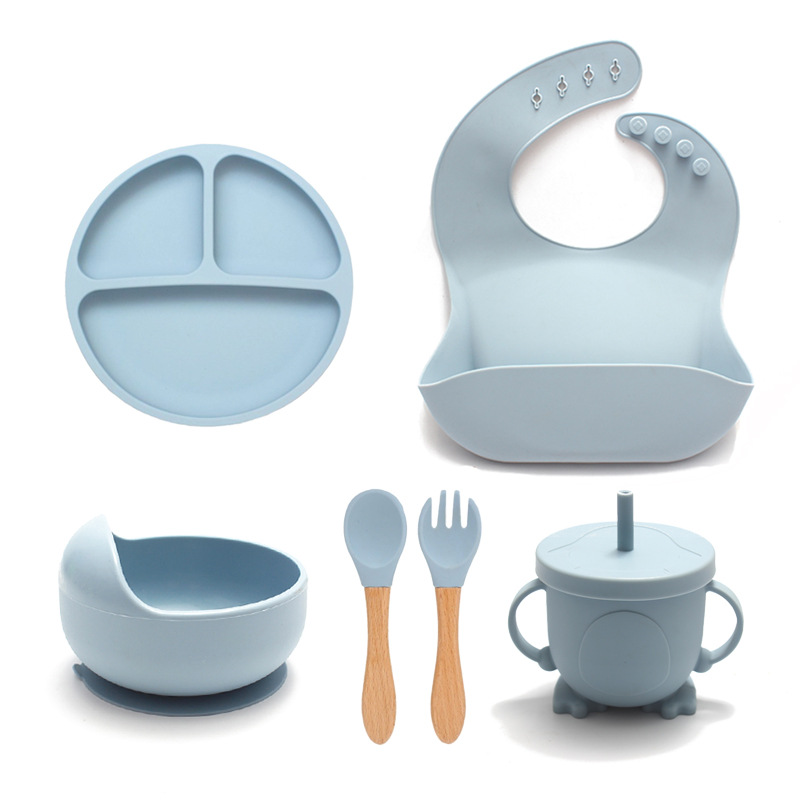 Plato de cena transfronterizo de silicona con ventosa, cuenco de comida integrado, vajilla dividida para bebé resistente a altas temperaturas, juego de ocho piezas al por mayor