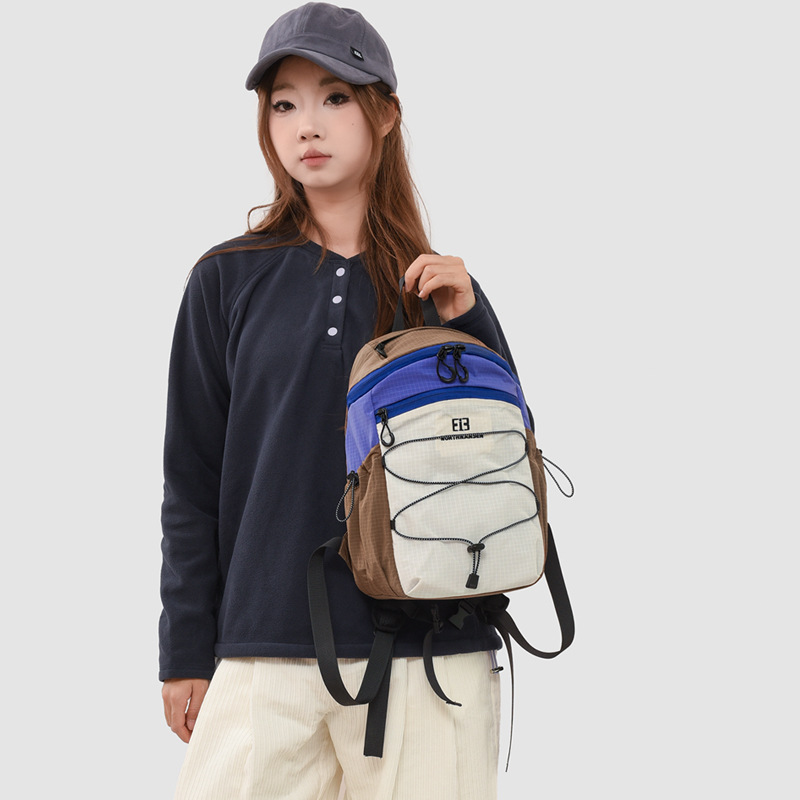 Mochila de senderismo transfronterizo al aire libre, nueva mochila de tela de nylon de gran capacidad, bolsa de viaje ligera y casual para niños