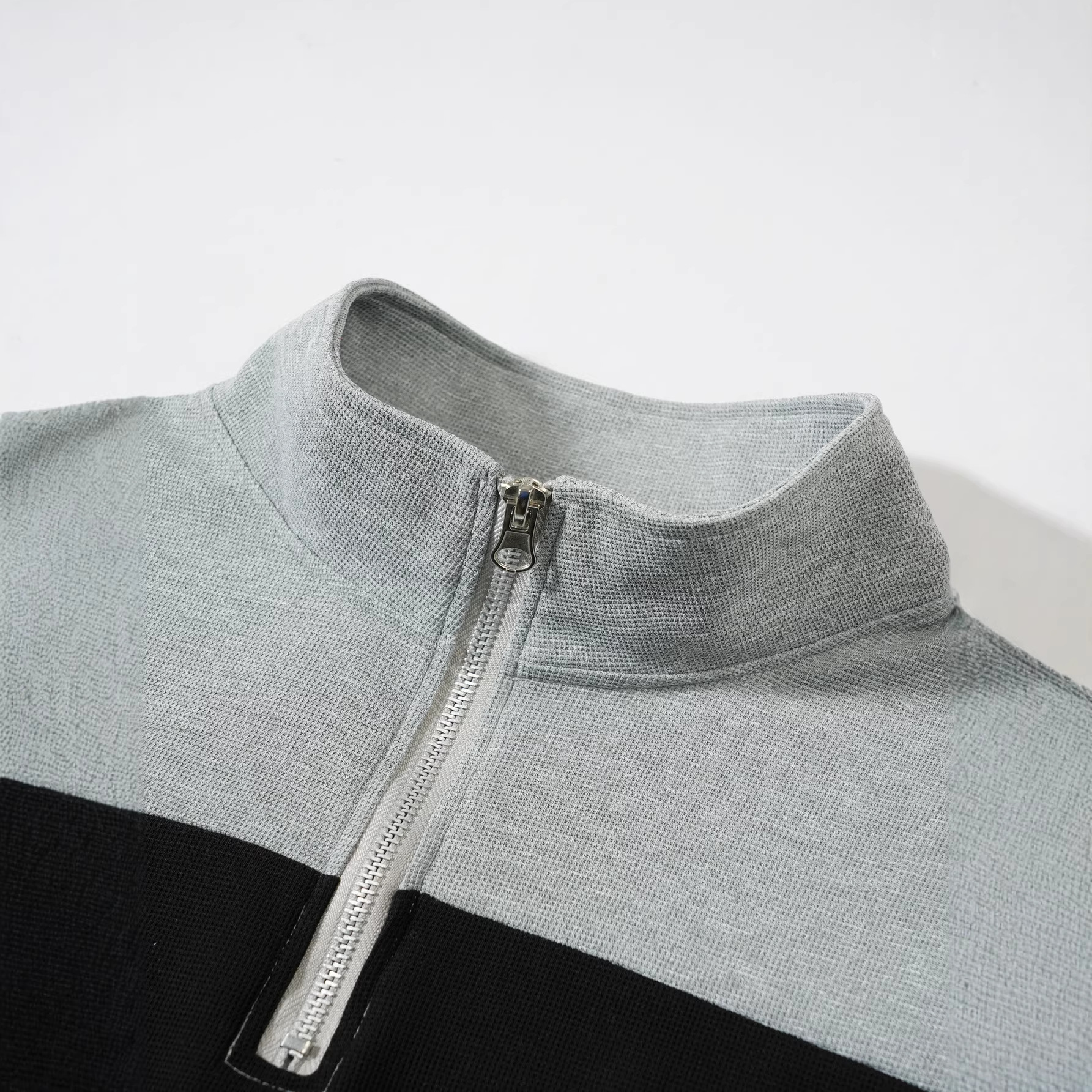 Transfronterizo tamaño europeo primavera otoño retro moda hombre cremallera con solapa de manga larga diseño de tendencia de temperamento jersey