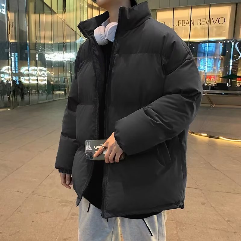 Abrigo de algodón acolchado para hombre de invierno engrosado 2022 nuevo color puro estilo de Hong Kong casual de moda Suelta todo fósforo abrigo de pan caliente