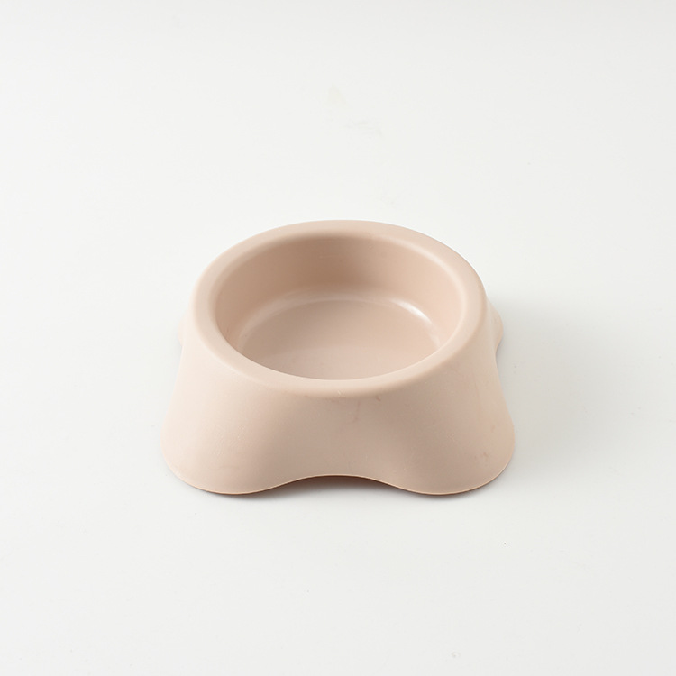 Pet Bowl perro de plástico solo Tazón perro Tazón de arroz gato vajilla engrosada antideslizante bebedero entrega de una pieza
