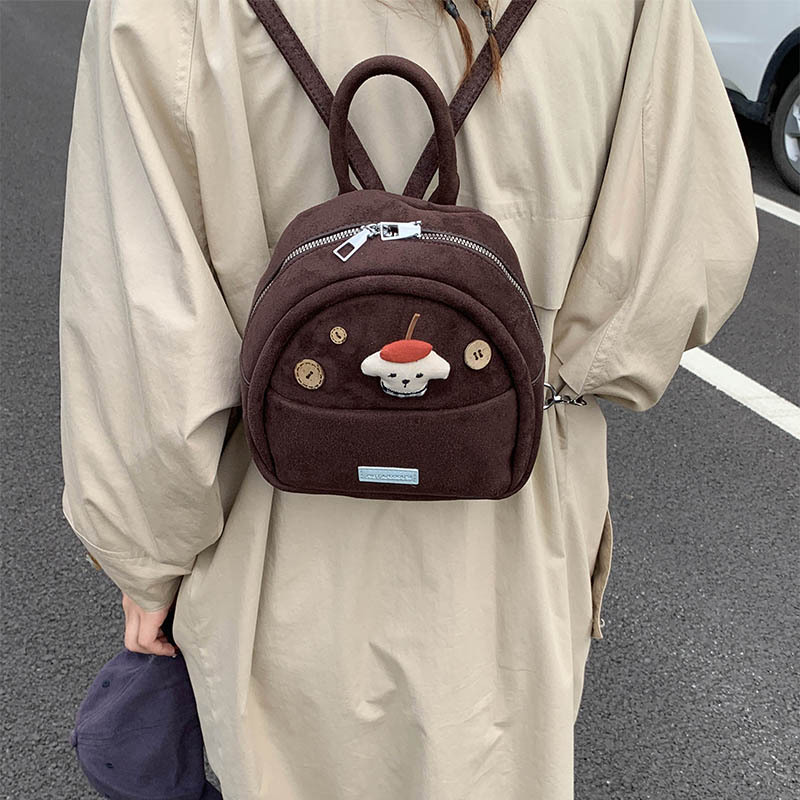 Caricatura lindo muñeca mochila de niña 2025 nueva moda mini mochila de comercio exterior transfronterizo mochila esmerizada mujer