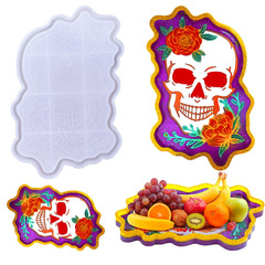 Confidently crafted Halloween skull-shaped resin mold, silicone tray, tabletop display, and coffin-style storage box