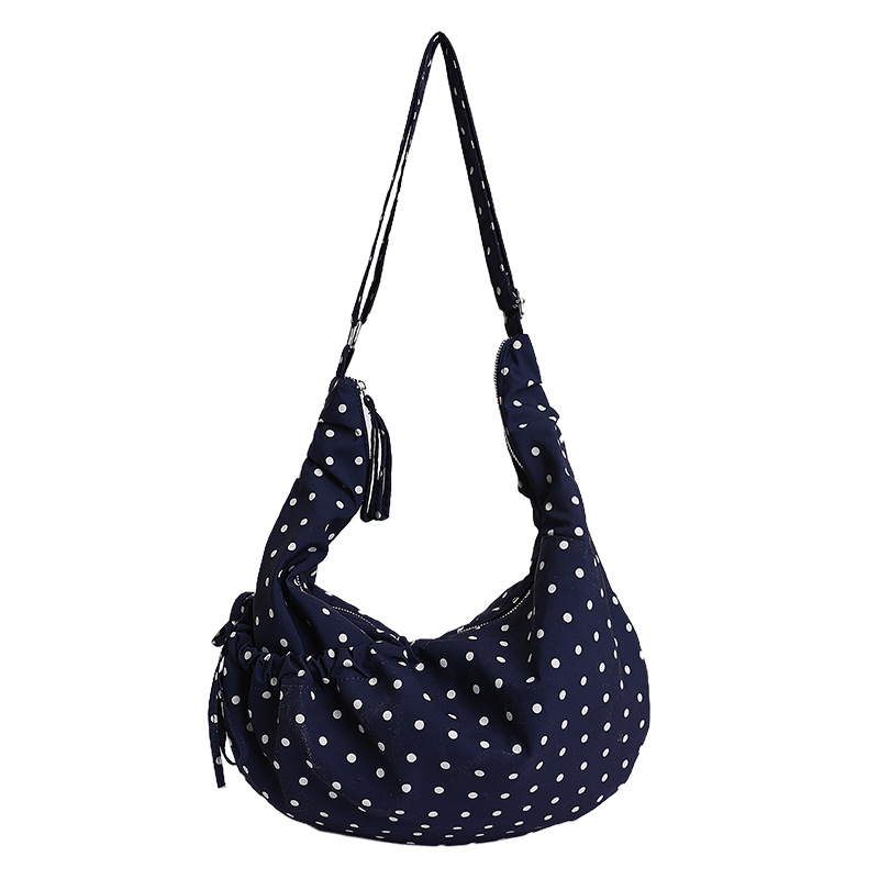 Bolsa de brazo de onda coreana para mujeres 2026 nueva bolsa de hombro de nicho de nicho de diseño diario de viajes extranjeros bolsas de bolsas