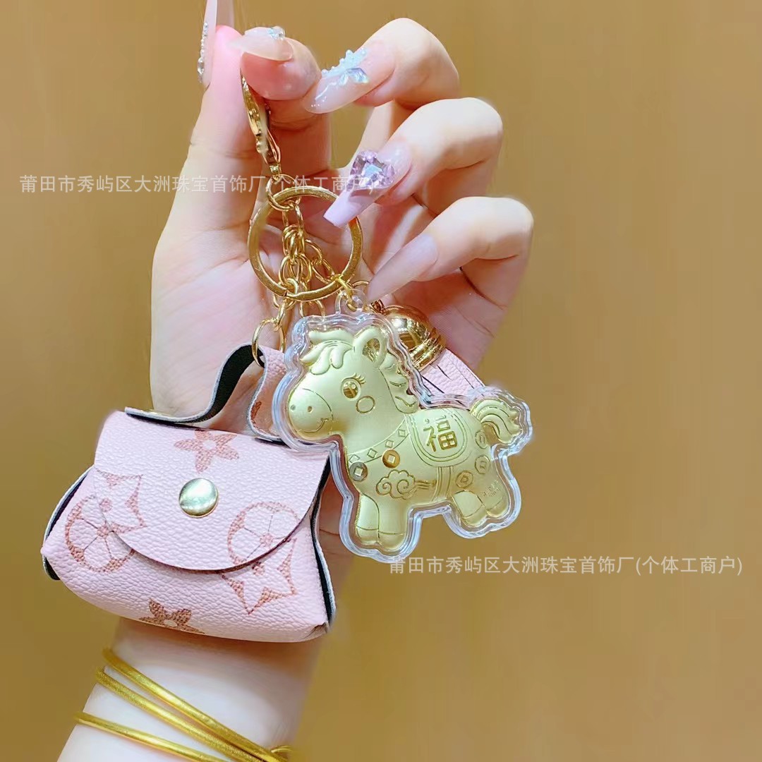 Año del Caballo de oro llavero de automóvil pequeño colgante 999 dinero de inmediato bolso llavero personalizado pequeño regalo