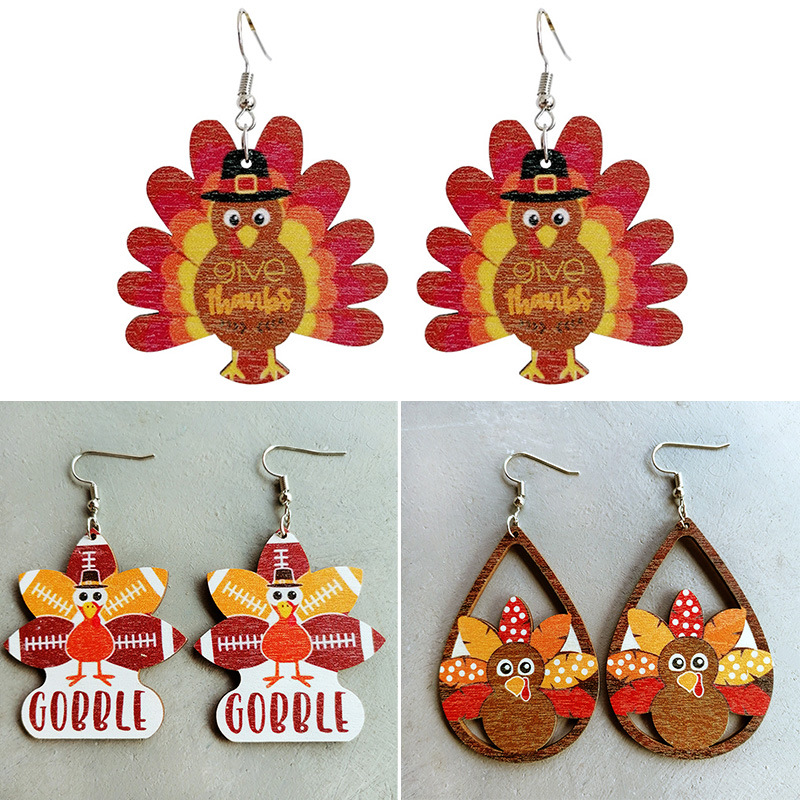 Football earrings drop-shaped