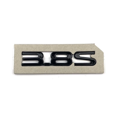 rear emblem, front emblem, and — Car logo - black-and-shiny-replacement-38s-logo-seal
