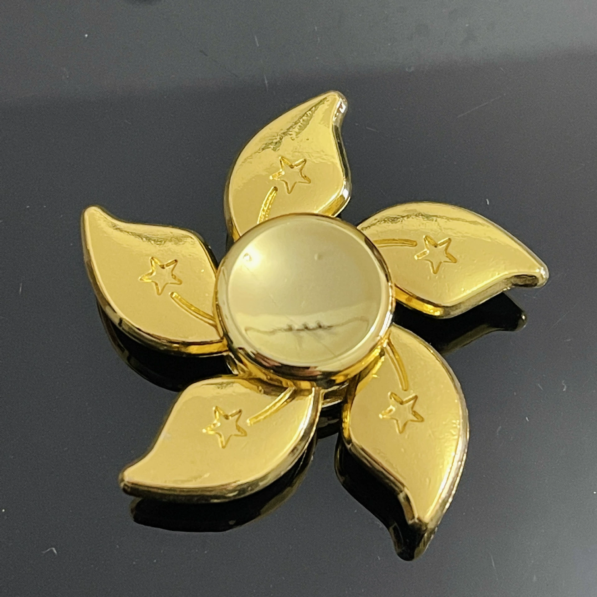 Golden spinning top for finger, wide color palette, anti-stress