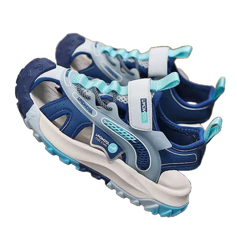 Niños sandalias Baotou 2026 verano nuevo estilo de moda para niños zapatos de playa para niños zapatillas suaves zapatillas individuales