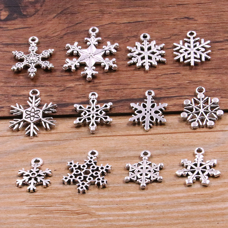12 DIY zinc alloy jewelry accessories Christmas charm all kinds of snowflake accessories luggage mobile phone necklace pendant 12 DIY zinc alloy jewelry accessories Christmas charm all kinds of snowflake accessories luggage mobile phone necklace pendant