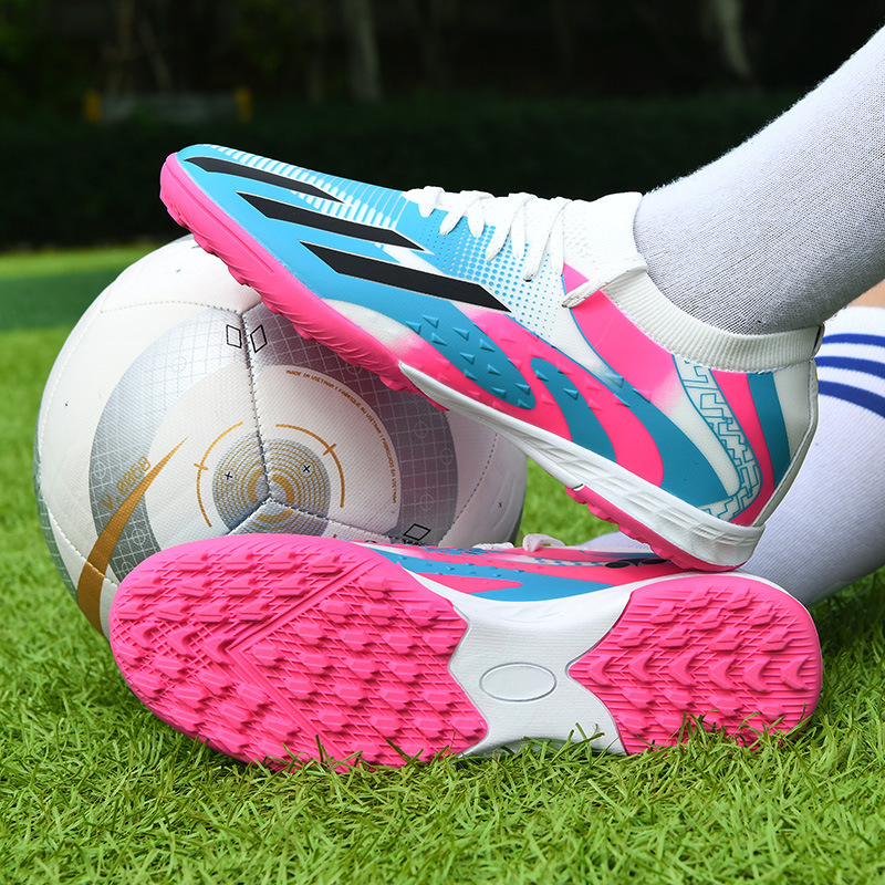 2025 nuevos zapatos de fútbol juveniles transfronterizos hombres y mujeres de clavos bajos zapatillas de fútbol fábrica directa