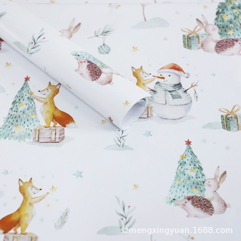 Nuevo regalo de vacaciones de Navidad regalo de dibujos animados niños caja de regalo papel de regalo decorativo papel de regalo papel de color rojo y verde