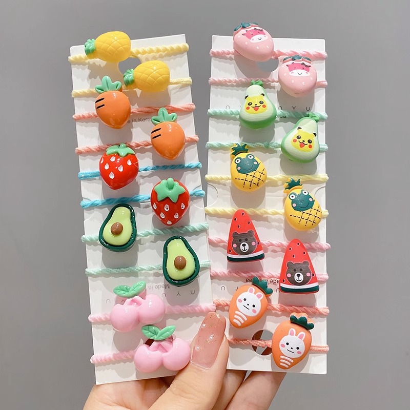 La cuerda del pelo del bebé de las muchachas de la banda de goma de los niños no lastima el pelo Los accesorios del pelo del pulgar del tamaño pequeño atan la banda de goma del pelo