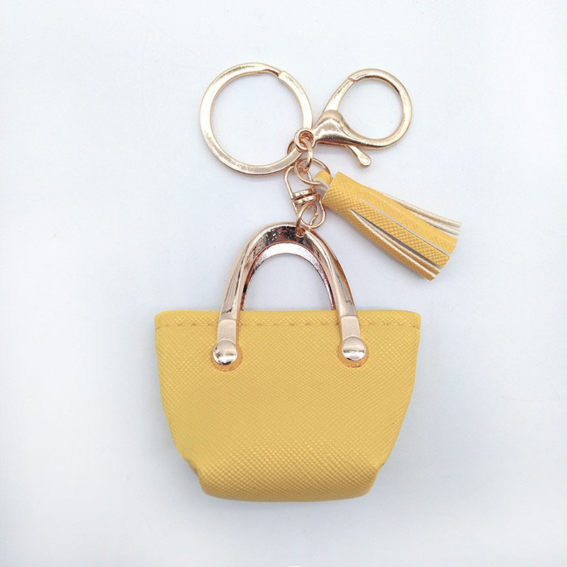 Llavero para mujer, bolso, colgante, joyería, mini monedero de almacenamiento de cuero lindo europeo y americano