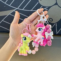 ポニーポーリーの数珠の公の子のカバンは女子学生のかわいい携帯のチェーンのペンダントの甘いクールな潮を包んでキーホルダーの贈り物を遊びます。