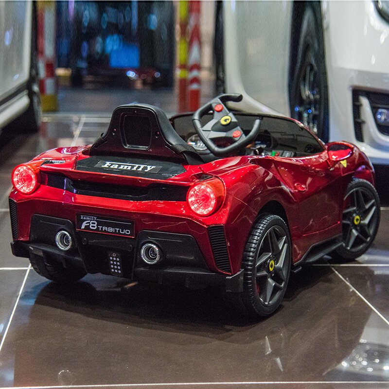 Carro eléctrico para niños se puede sentar en un coche de cuatro ruedas para bebés de 3 - 6 años de edad, carga de control remoto simulación de juguetes exportación