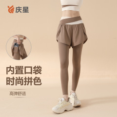 偽の2つのポケットヨガパンツの外に弾力性の高い腰を着て尻を上げて走るフィットネス運動タイツは光ヨガを防ぐ