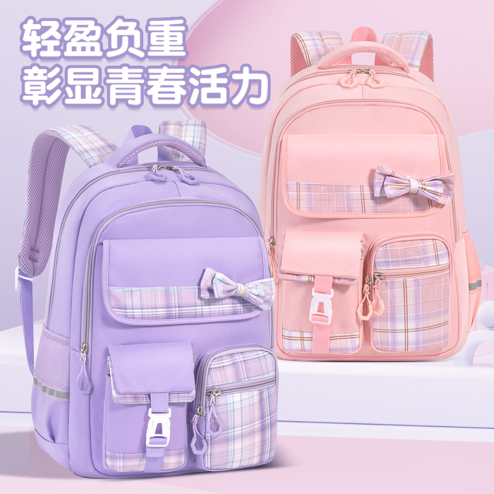 小学生蝴蝶结书包中学生大学生双肩包大容量轻便拉杆背包高耐脏