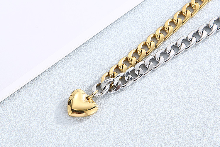 wholesale Europe and America OT buckle heart pendant stainless steel suit wholesale