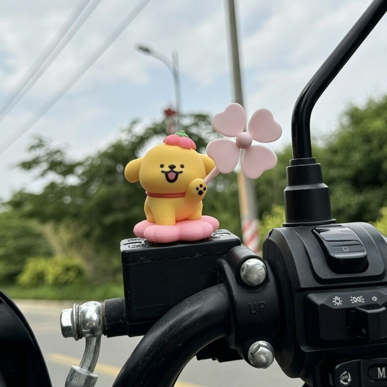 Bicycle dog figurine, windmill line dog ornament, electric vehicle decoration, cute motorcycle accessory