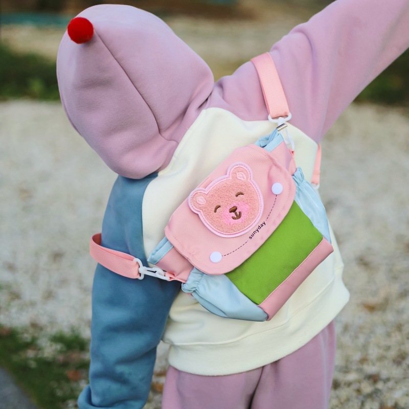 New baby-specific niche cartoon bear multi-functional backpack, color-blocked children's schoolbag, versatile and lightweight shoulder bag