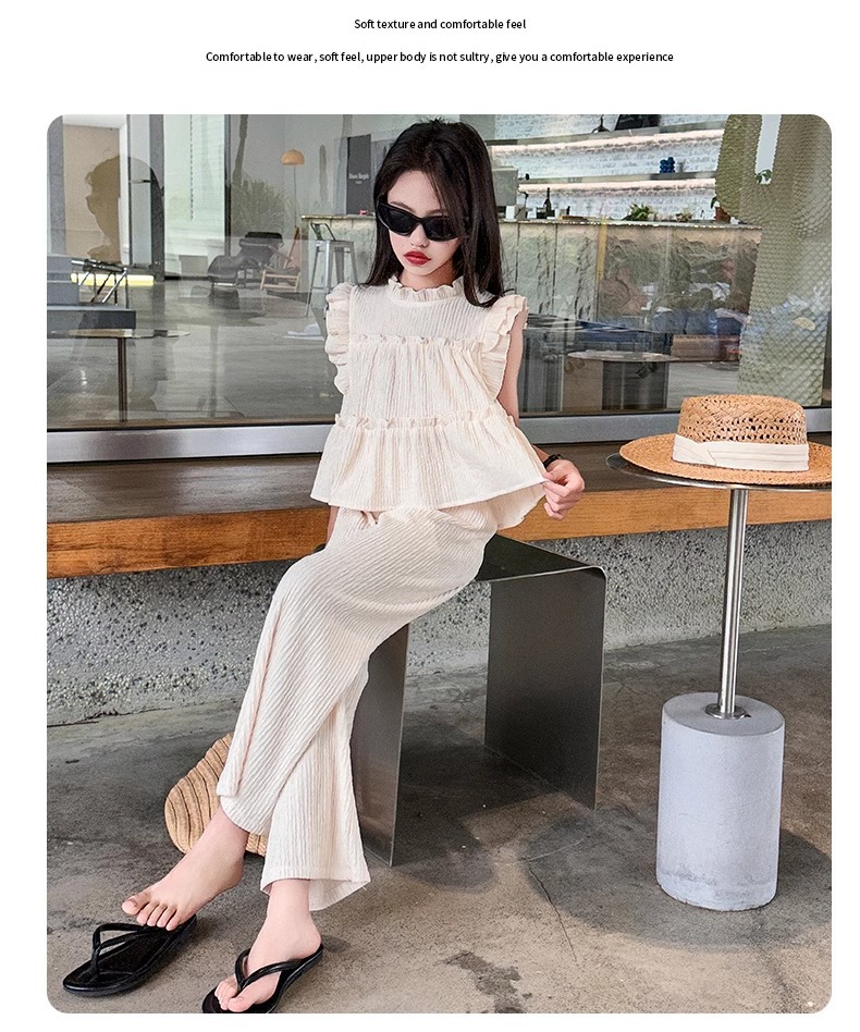 Completo bimba top senza maniche e pantaloni gamba larga_voghion.com