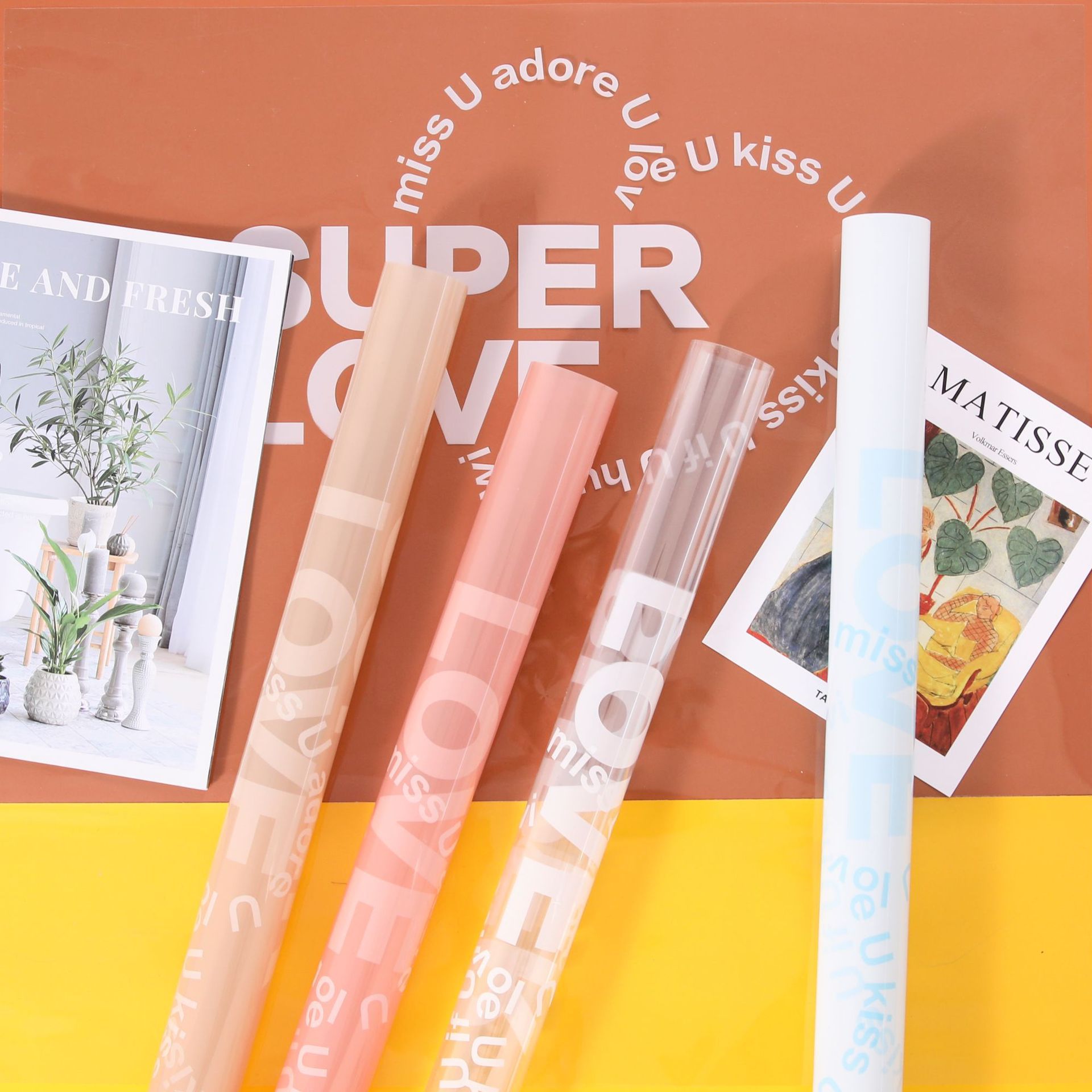 厂家批发新款彩色透明纸沁夏love果冻膜爱心高颜值鲜花花束包装纸