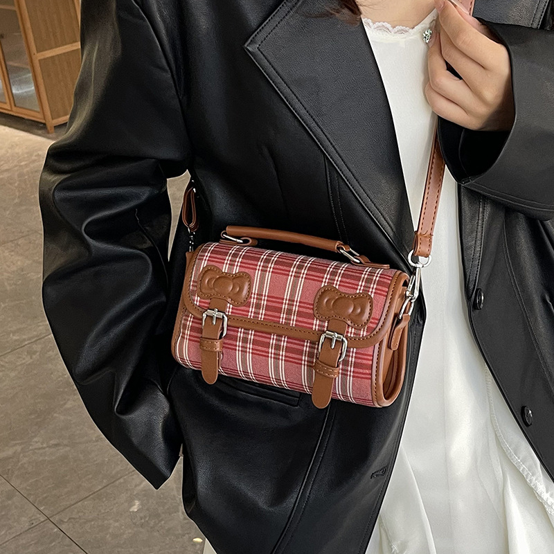 2025 otoño y invierno nuevo estilo británico bolso de mano casual versátil bolso de hombro a rayas bolso de viaje coreano