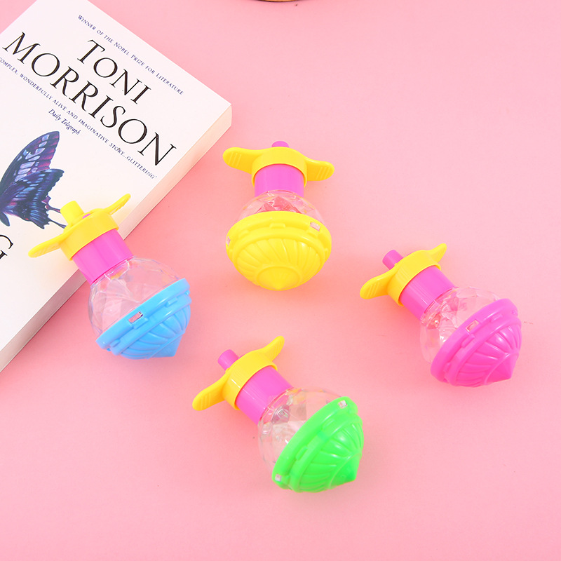 Nuevo transmisor luminoso Gyro pequeño regalo al por mayor kindergarten bebé pequeños juguetes de los niños