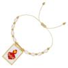 Woven golden bracelet from pearl heart-shaped, boho style