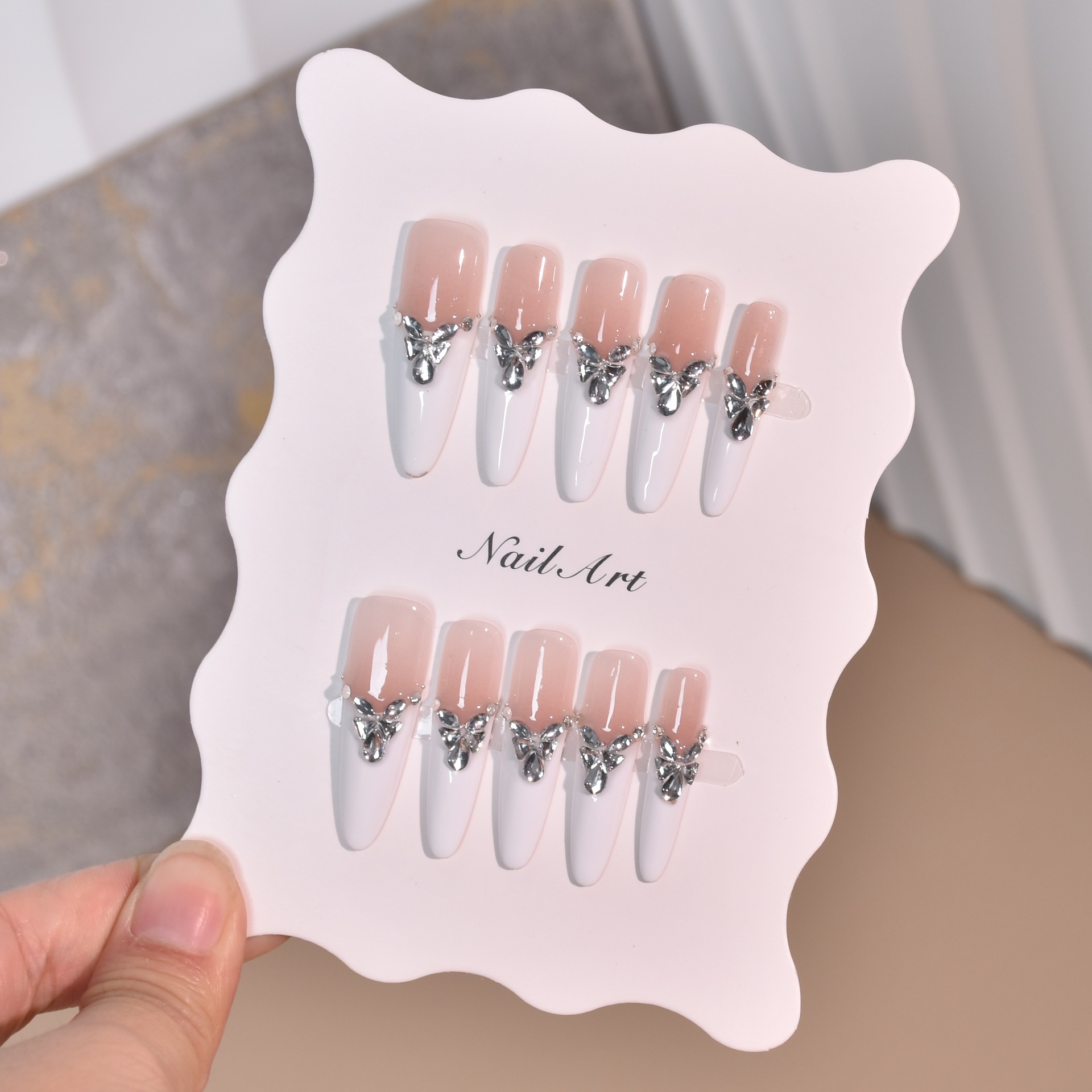 Uña pura mano alta sensación blanca francesa parche de uñas parche de uñas fabricantes al por mayor parche de uñas falsas