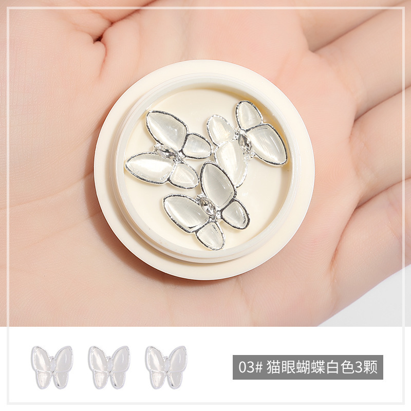 Online popular hielo transparente Aurora mariposa joyería cristal blanco piedra tridimensional uñas diamante Super Flash rhinestone uñas joyería