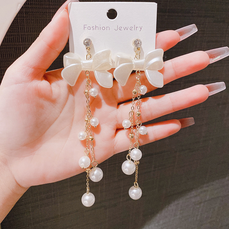 sophisticated elegant universal earrings with bow with tassels