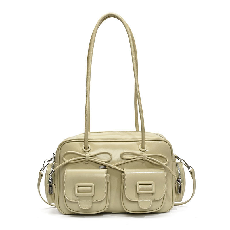 Bolsa de brazo coreana de arco de gran capacidad de moda extranjera bolso de hombro de viaje diario bolso de nicho de diseño