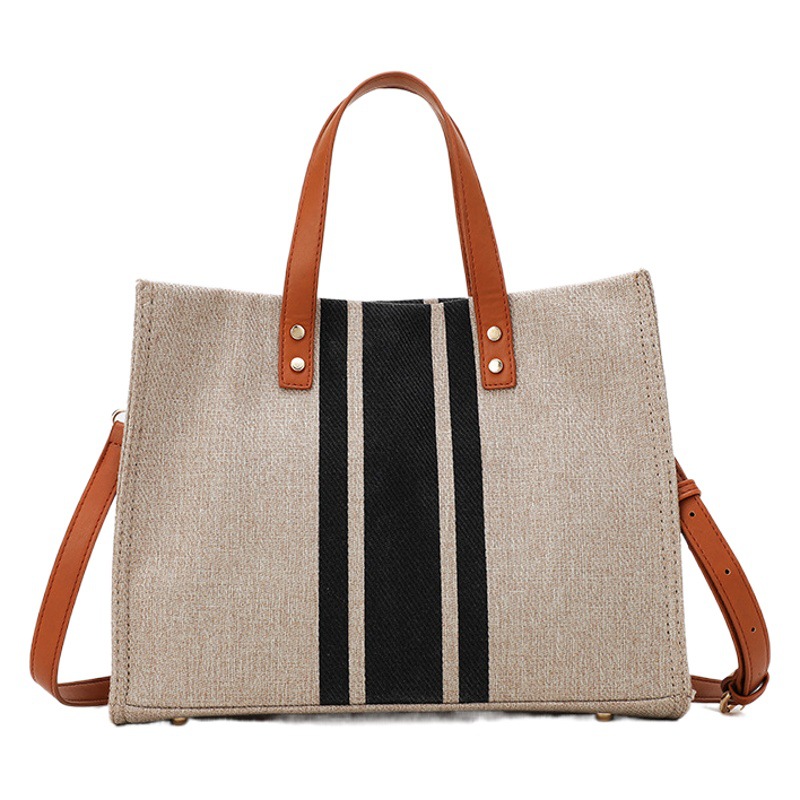 Maletín portátil de estilo coreano para mujer bolso de mujer de rayas de cercanías profesional bolso de hombro simple bolso de lona de gran capacidad para mujer