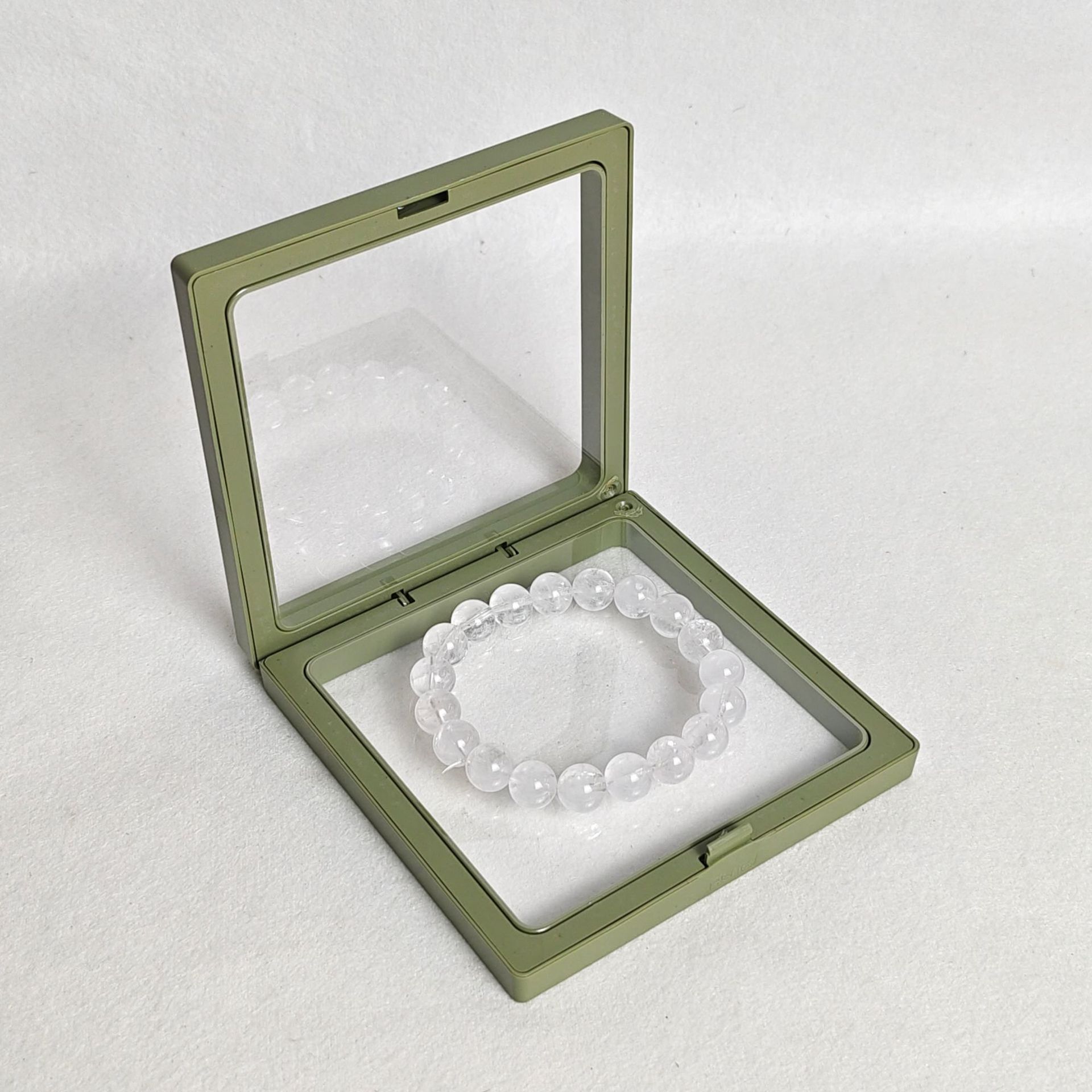 Fruit green pe film box; length and width 9*9cm, thickness 2cm