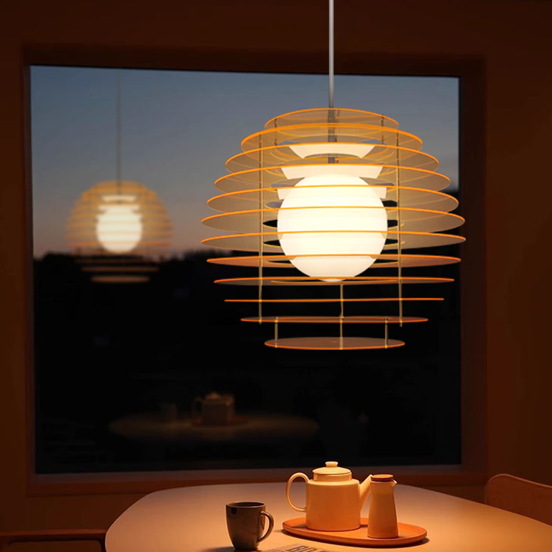 Sunset naranja candelabro restaurante cabecera bar isla meseta antiguo Bauhaus Memphis diseñador atmósfera luces retro
