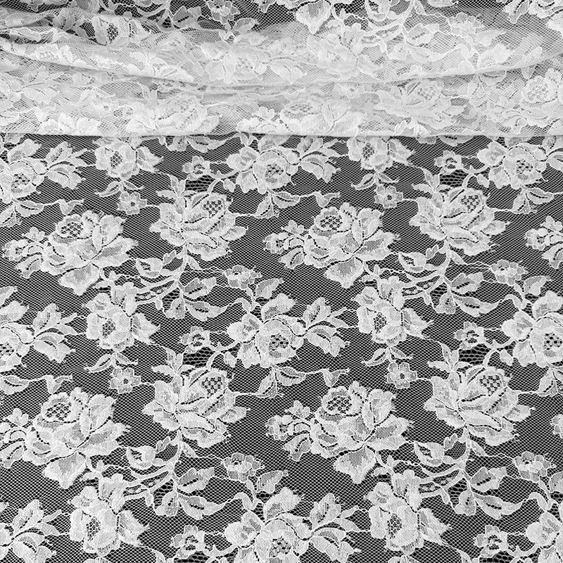 Tela de encaje Primavera/Verano 2026, encaje calado con diseño de rosas, tela con borde de pestañas, varios colores disponibles, stock de fábrica.