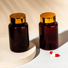 厂家定制PET100ml固体瓶金属盖胶囊瓶聚酯瓶药瓶茶色塑料瓶