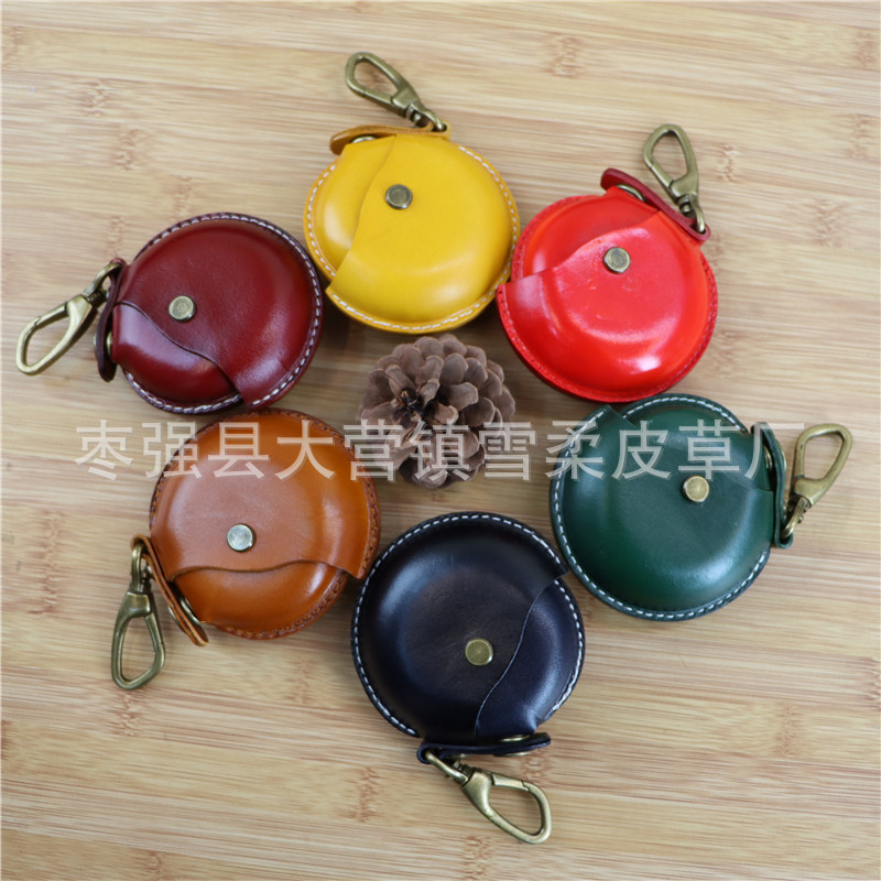 クリエイティブな一層牛革製ハンドメイド小銭入れ、イヤホンケーブル収納バッグ、丸型バッグ、ペンダント、小物入れ、レトロ収納バッグ