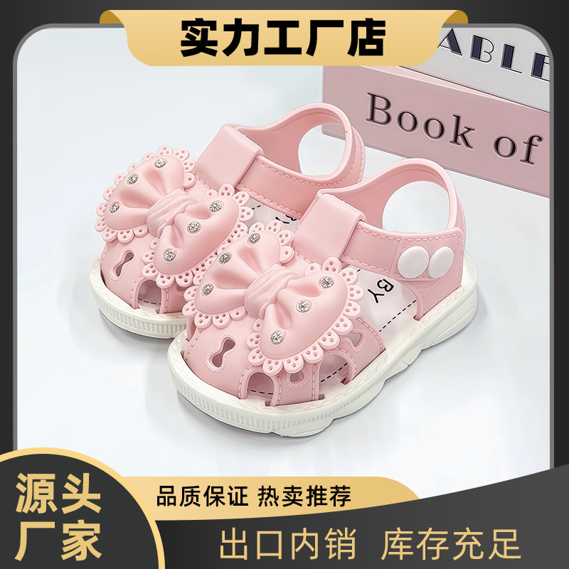 Fábrica de sandalias al por mayor transfronterizas suministro directo de arco de perforación de agua pequeña y media niña bebé zapatos de toddler pequeña princesa